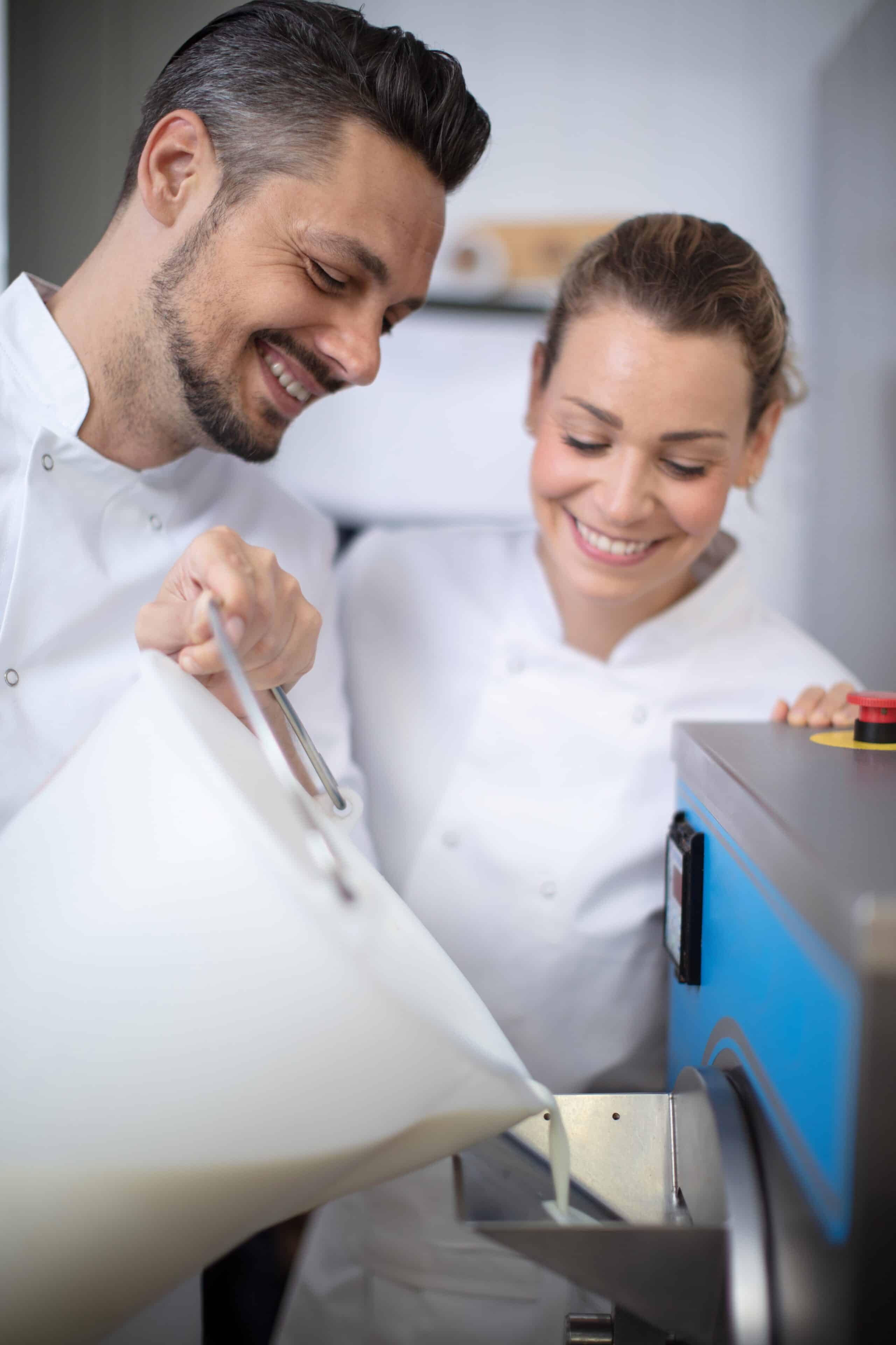 Chef Pouring Basis into an Ice Cream Freezer Machine